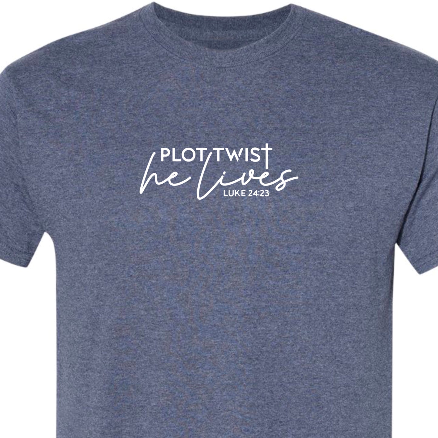 Heather navy adult tshirt that reads, in white lettering: Plot Twist, He Lives - Luke 24:23