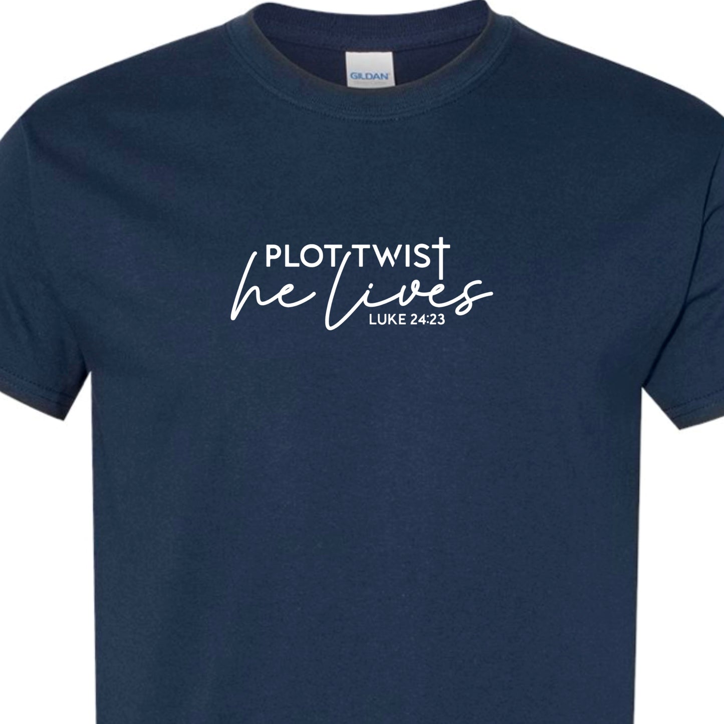 Navy adult tshirt that reads, in white lettering: Plot Twist, He Lives - Luke 24:23