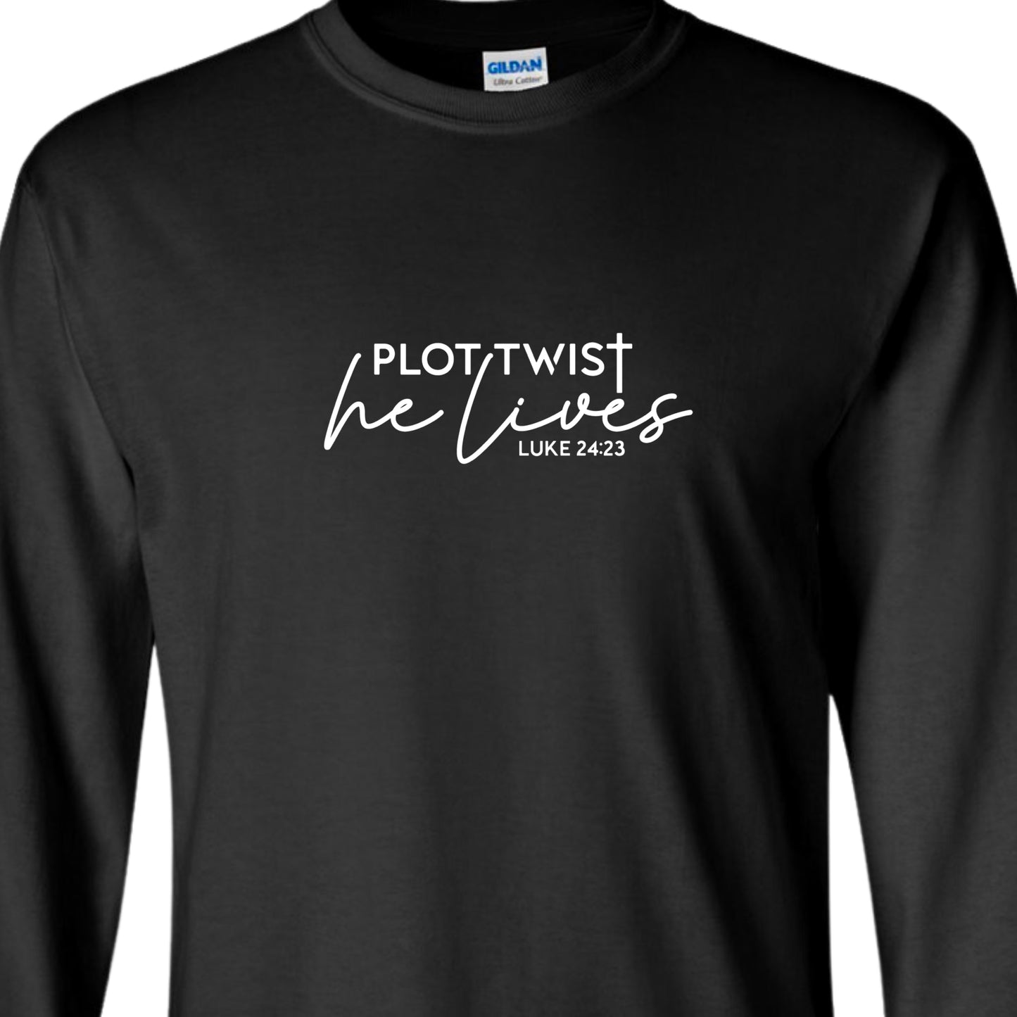 Black adult long sleeved shirt that reads, in white lettering: Plot Twist, He Lives - Luke 24:23